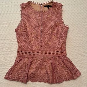 Lined, peplum pink lace top. Office or night out!